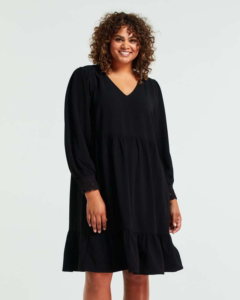 Front of a model wearing a size 1X Nicola Dress in Black by Estelle. | dia_product_style_image_id:235066